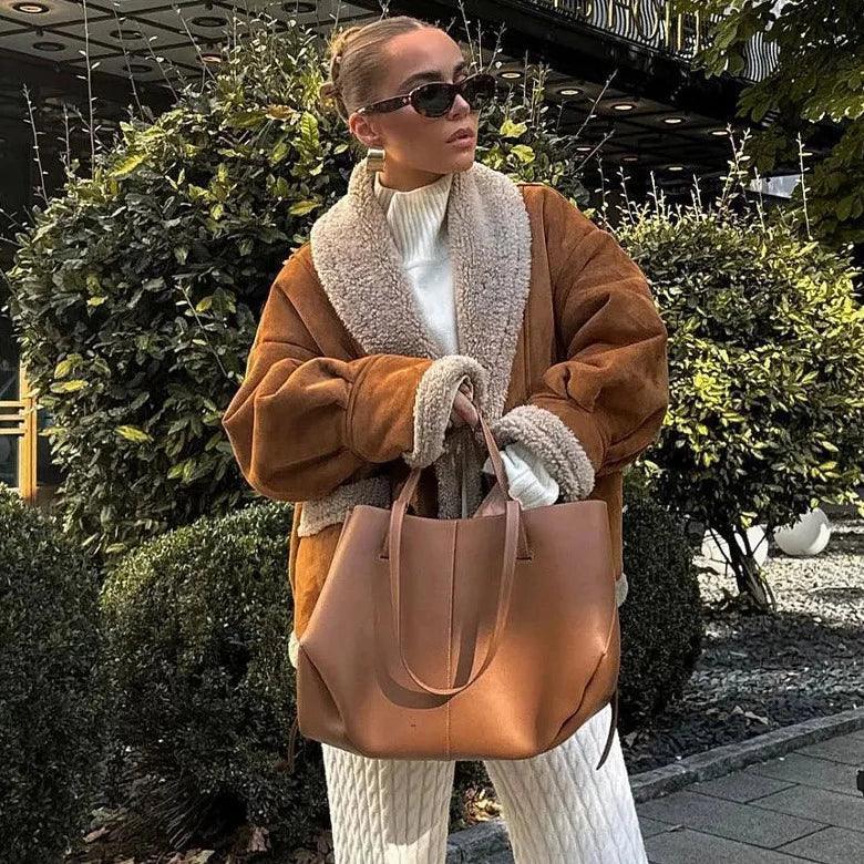Oversized shearling jacket with knit sweater and quilted pants.