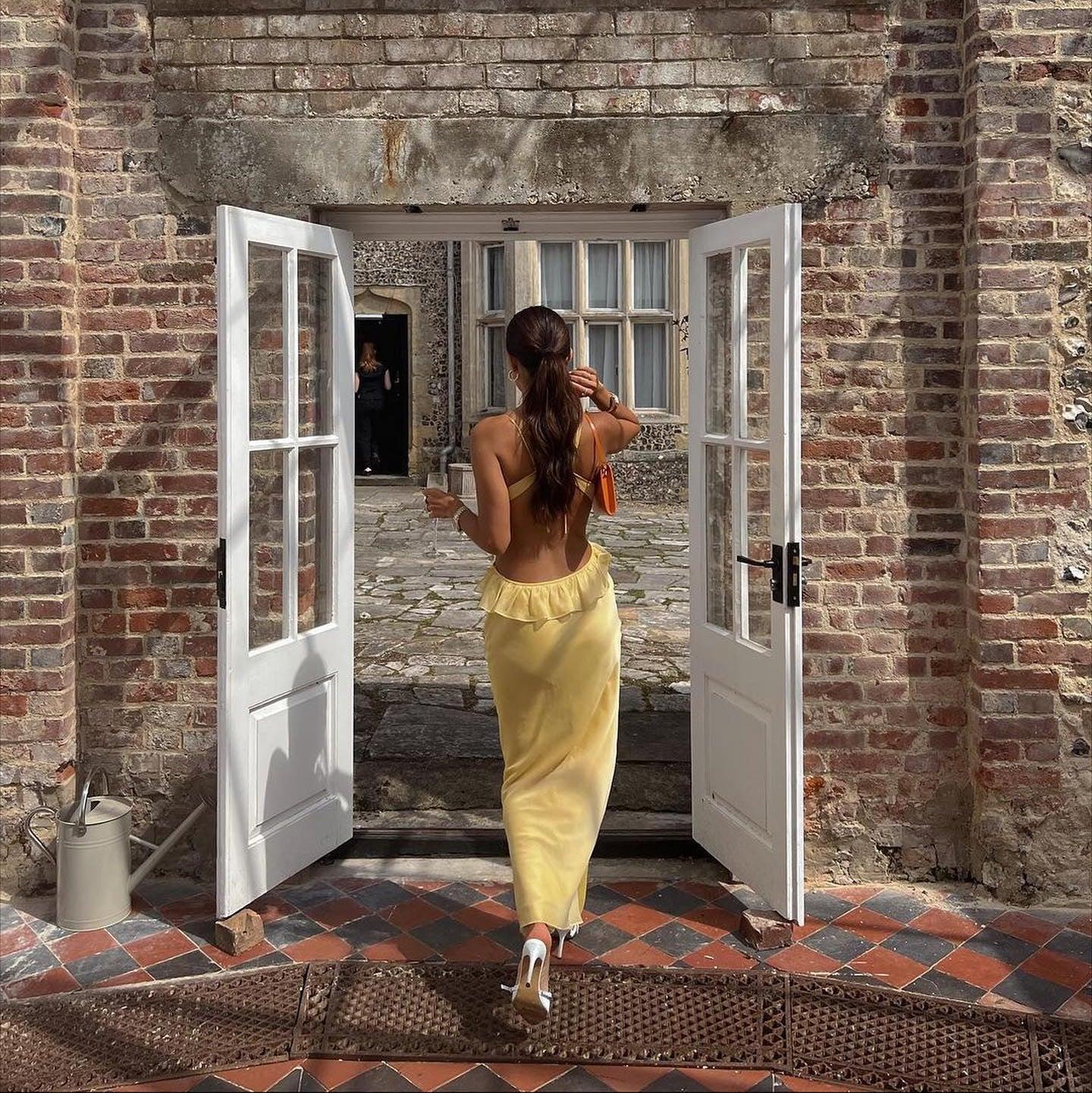 backless maxi dress with ruffled detail, evening look