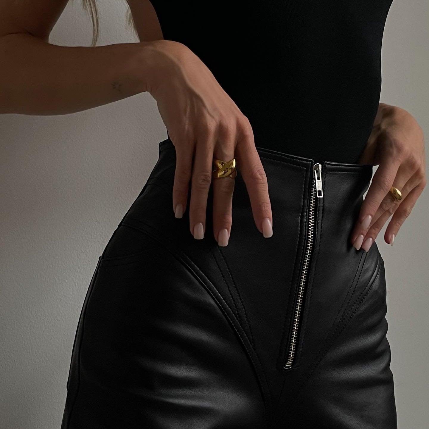 black leather high-waisted skirt with zipper detail
