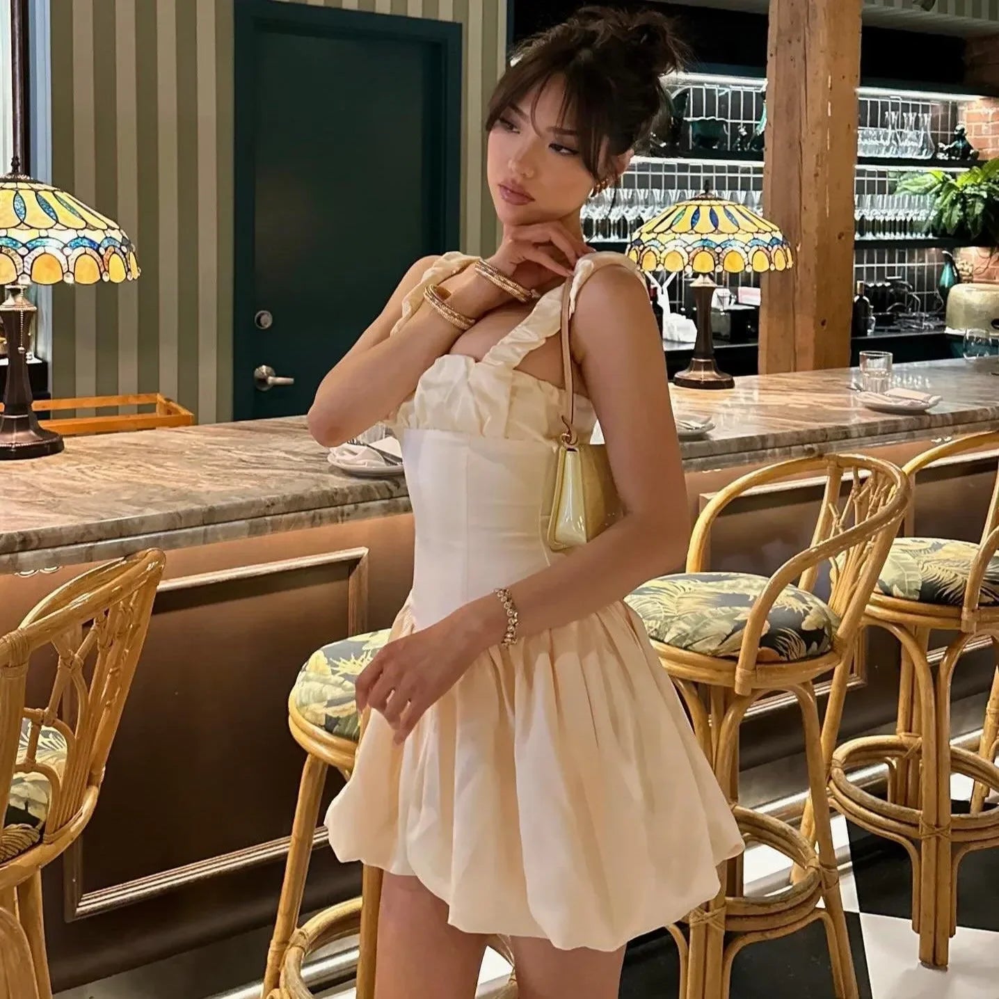 ruffled mini dress with structured bodice, evening look
