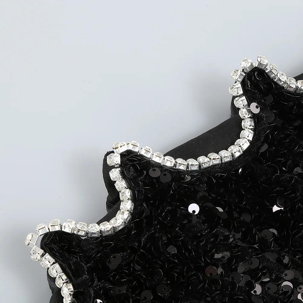 black sequined clutch with crystal embellishments, evening accessory