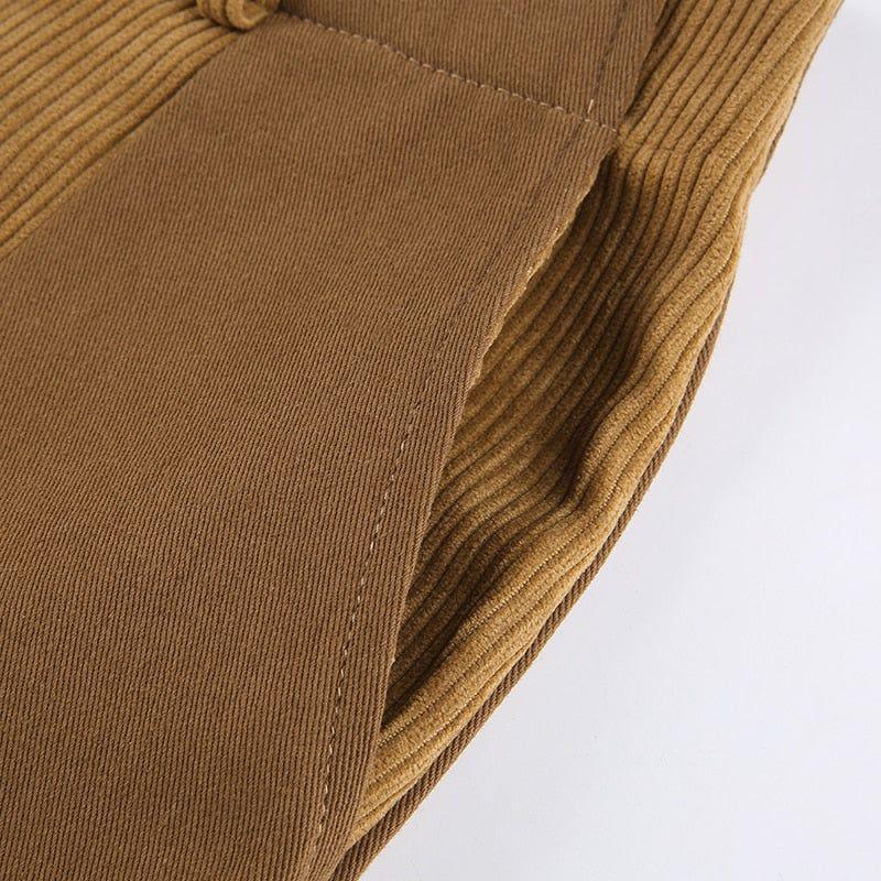 ribbed knit fabric in camel color, close-up detail view