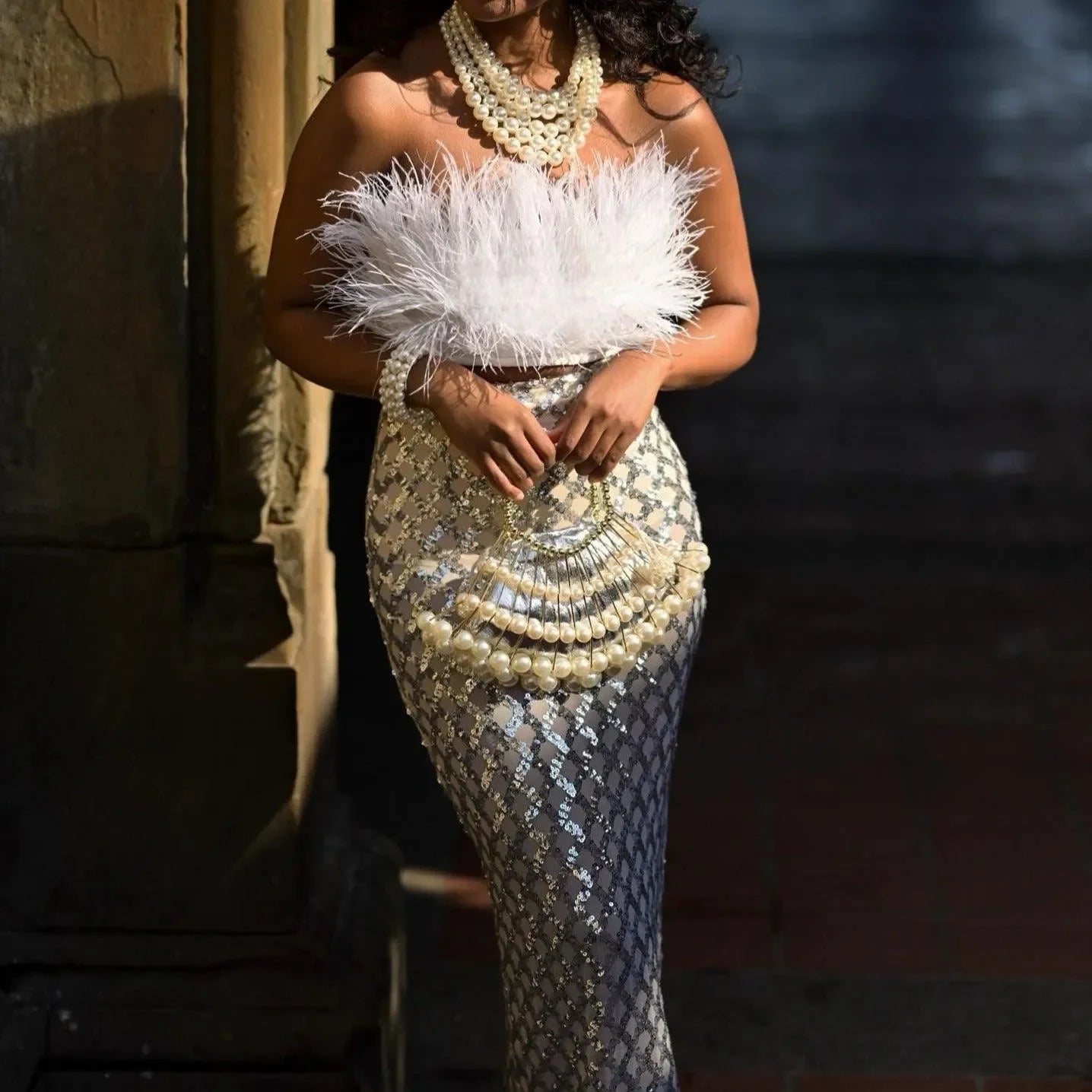 feathered strapless top with sequin maxi skirt, evening wear