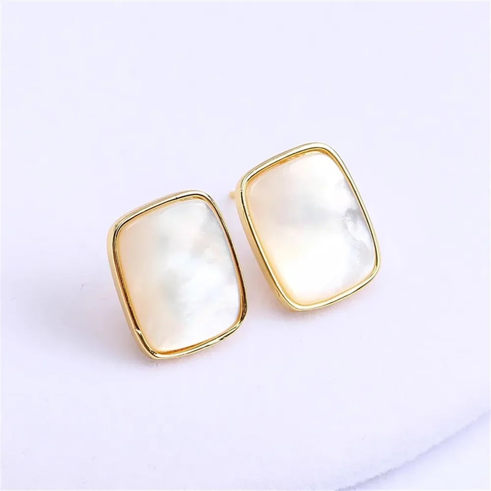 mother-of-pearl square stud earrings with gold trim