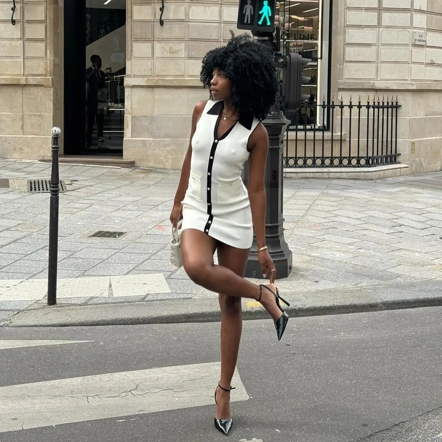 collared button-up mini dress with black pointed heels, chic daytime look