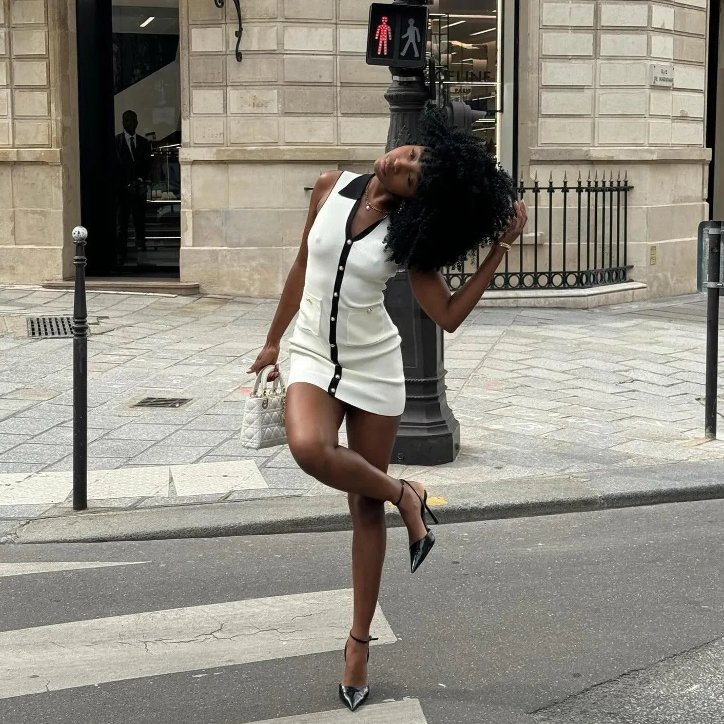 button-up mini dress with black trim, street style look, quilted handbag, pointed-toe heels