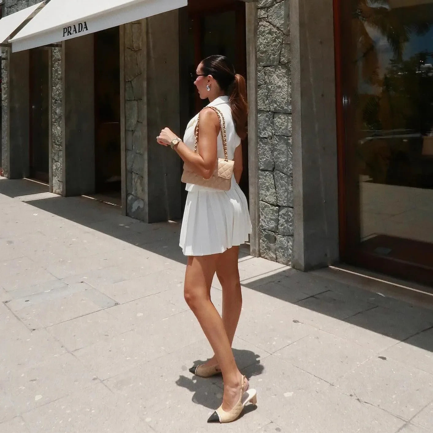white sleeveless mini dress, casual daytime look