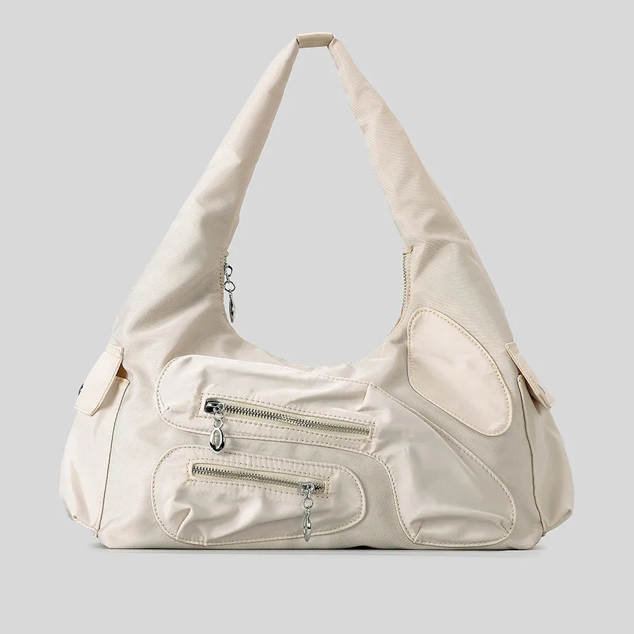 cream handbag with zipper details