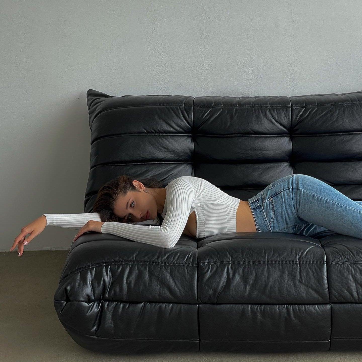 ribbed long-sleeve crop top with high-waisted jeans, casual style