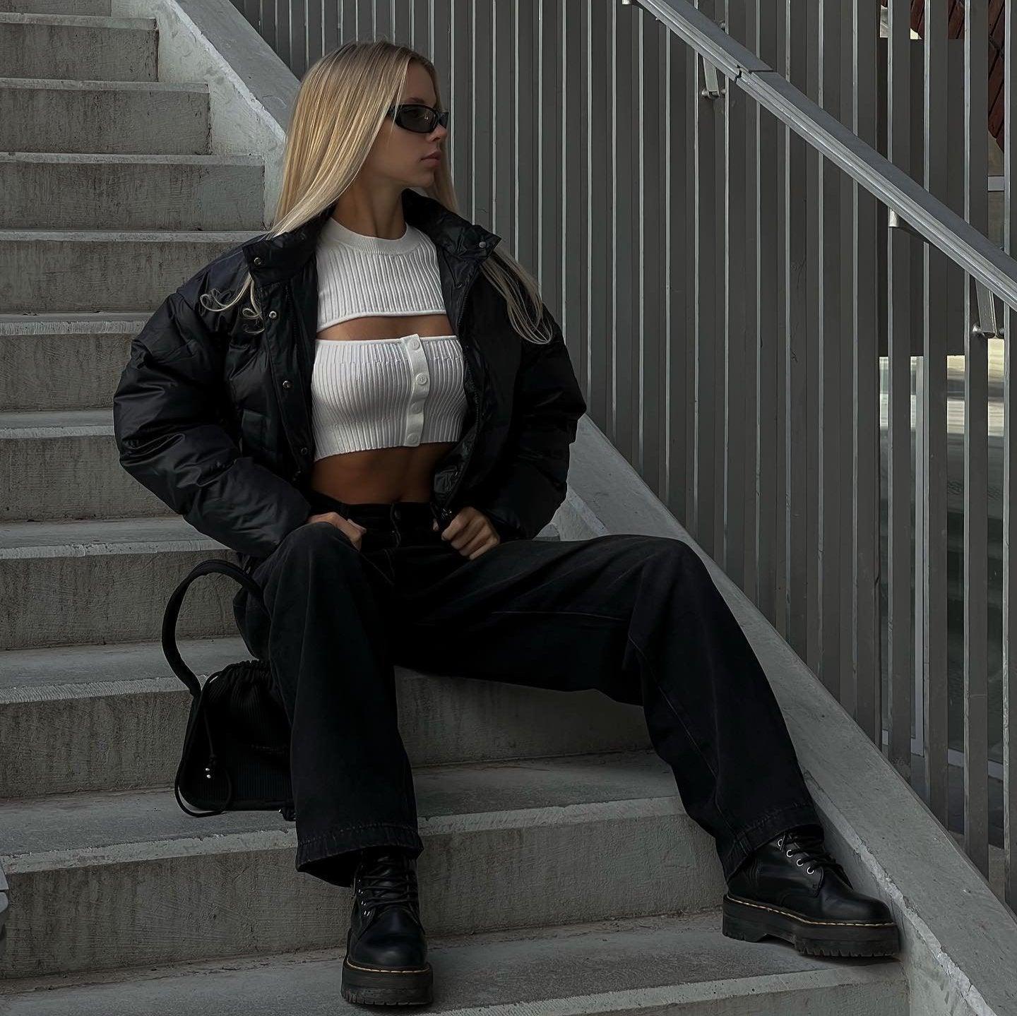 black puffer jacket with ribbed cutout top and wide-leg pants, casual streetwear style