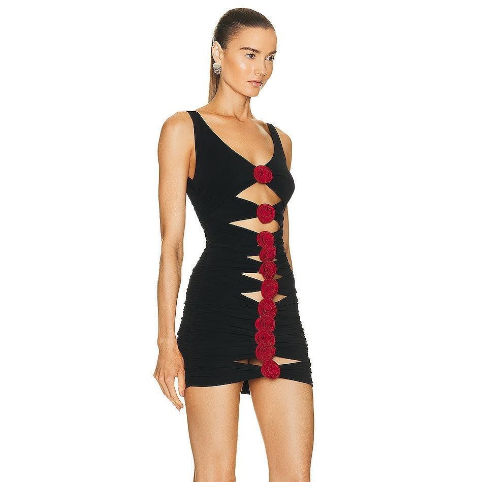 ruched black mini dress with red floral cutout design, evening wear