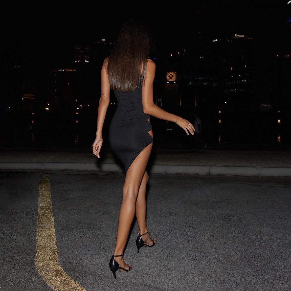 black bodycon mini dress with high slit, night-out look