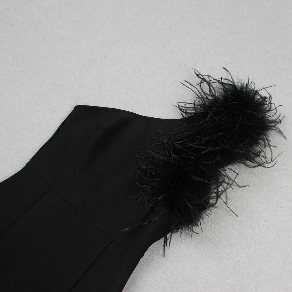 one-shoulder black dress with feathered detail, evening look