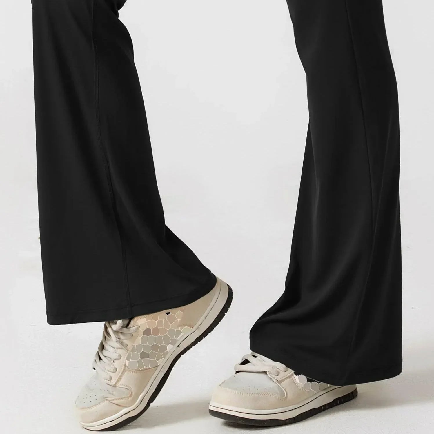 flare black pants with casual sneakers