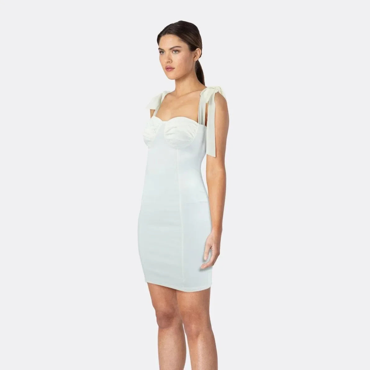 white ruched bodycon mini dress with ribbon straps, evening look