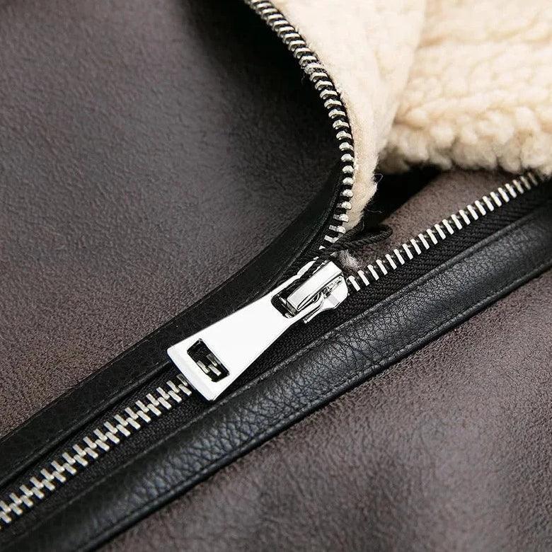 faux leather jacket with shearling lining, close-up of zipper detail