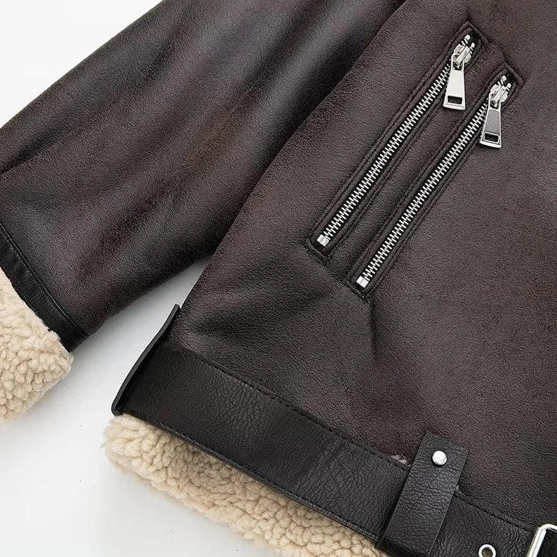 brown leather jacket with shearling trim and zipper details
