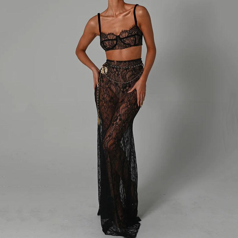 Black lace maxi skirt set with sheer overlay, paired with a matching lace bralette, styled for a chic evening look.