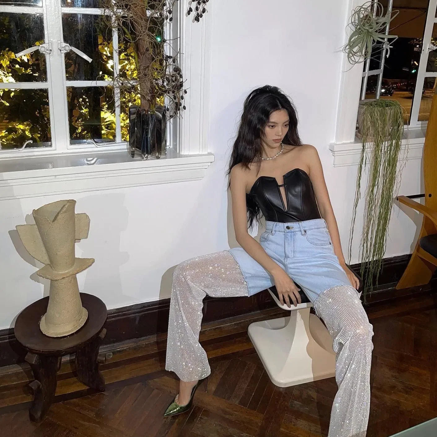 leather corset top with sequin embellished jeans, night-out style