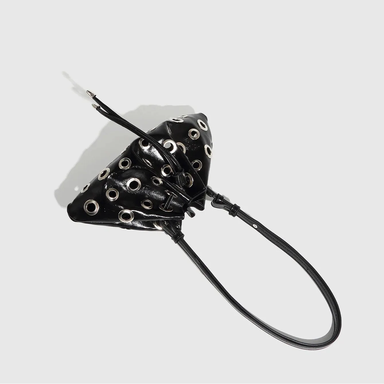 black grommet drawstring handbag, edgy accessory