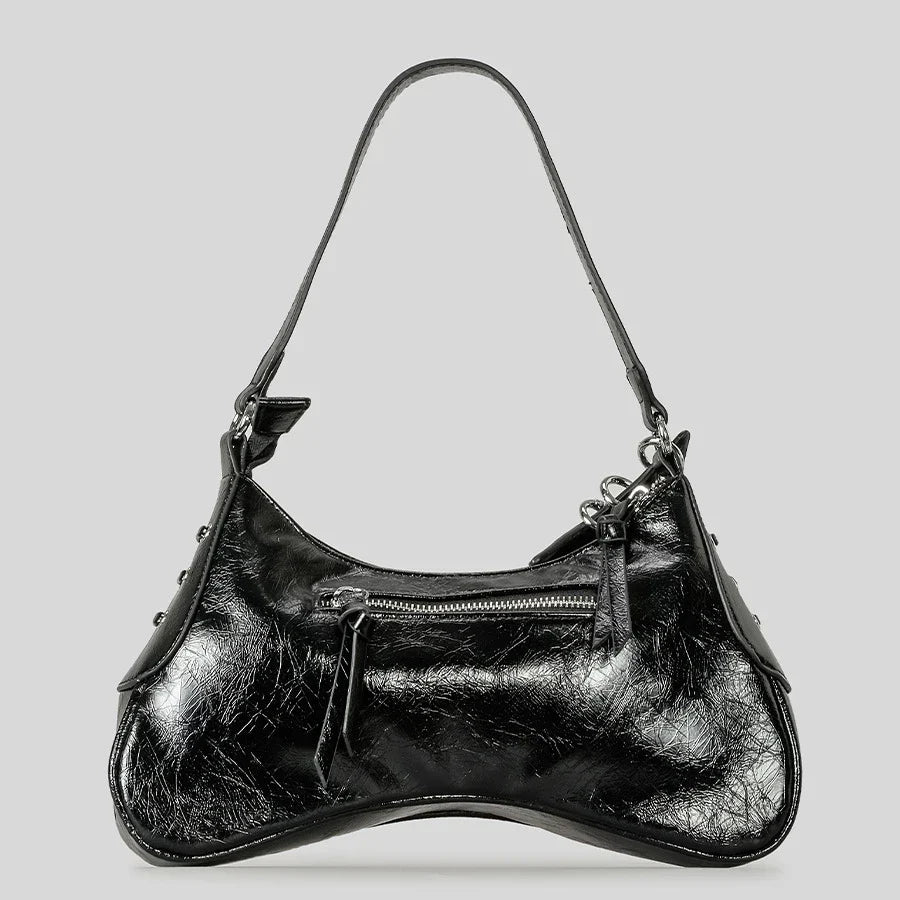 black patent leather handbag with zipper detail
