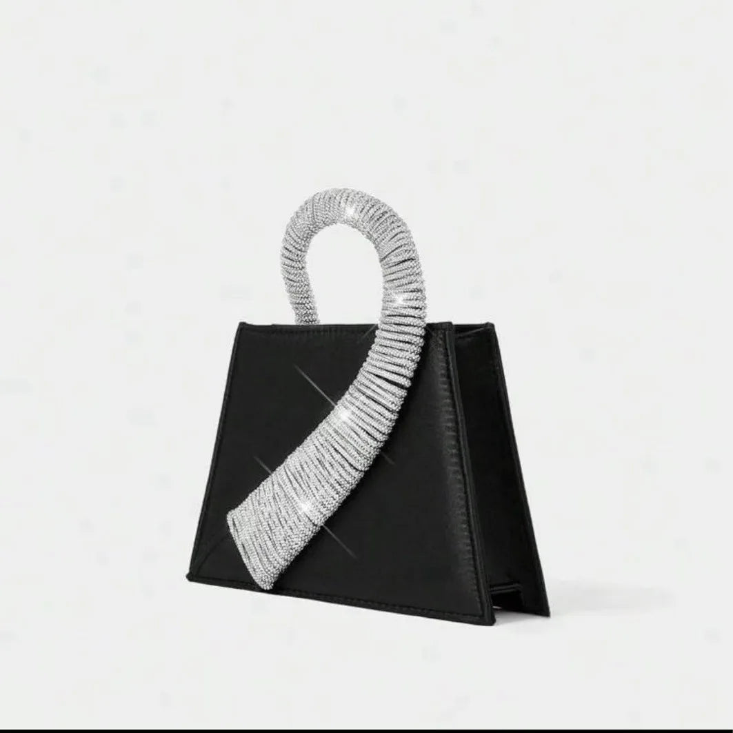black handbag with crystal embellished handle, evening accessory