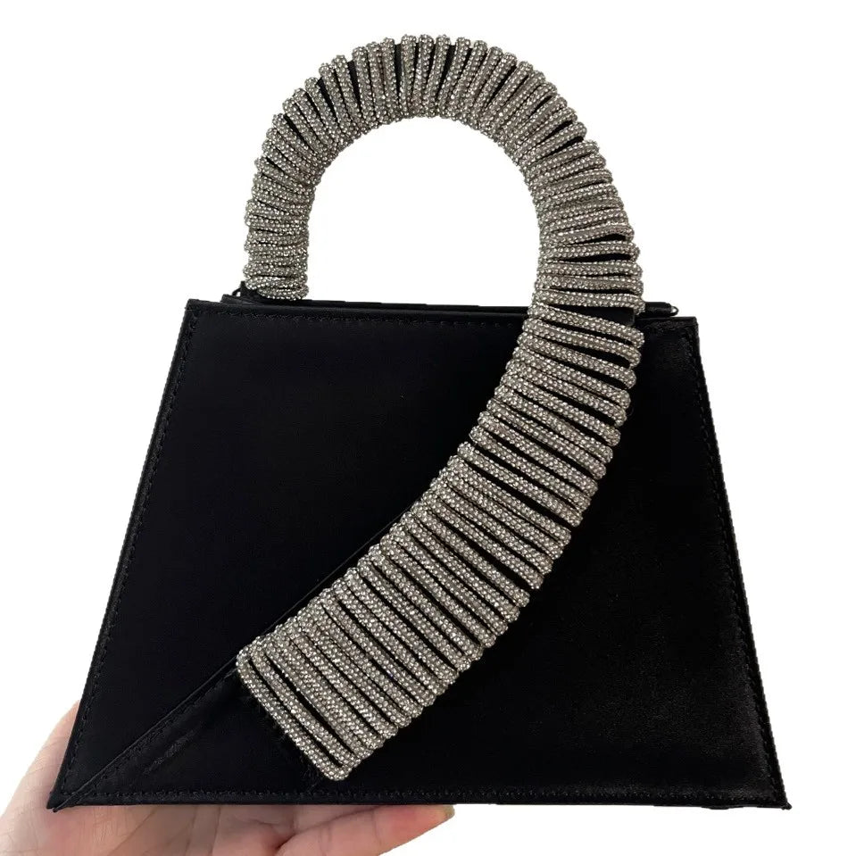 black handbag with rhinestone embellished handle, evening accessory