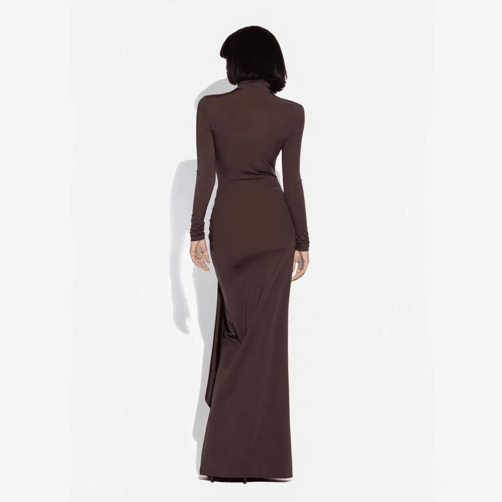 Brown long sleeve maxi dress with a sleek fit and side slit, perfect for dressing up or casual outings.