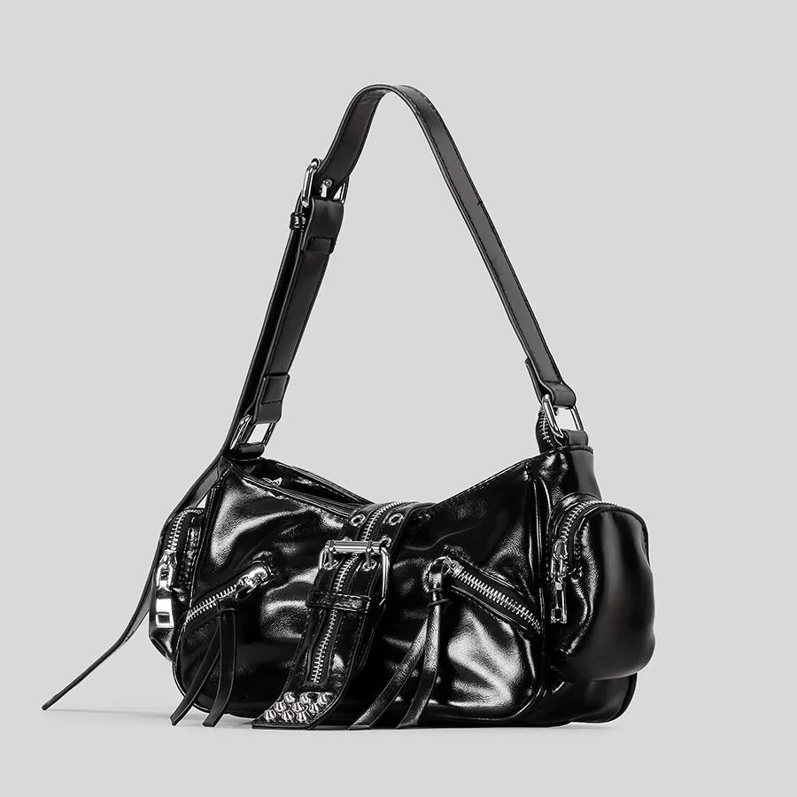 Black leather bag with zipper details and adjustable strap.
