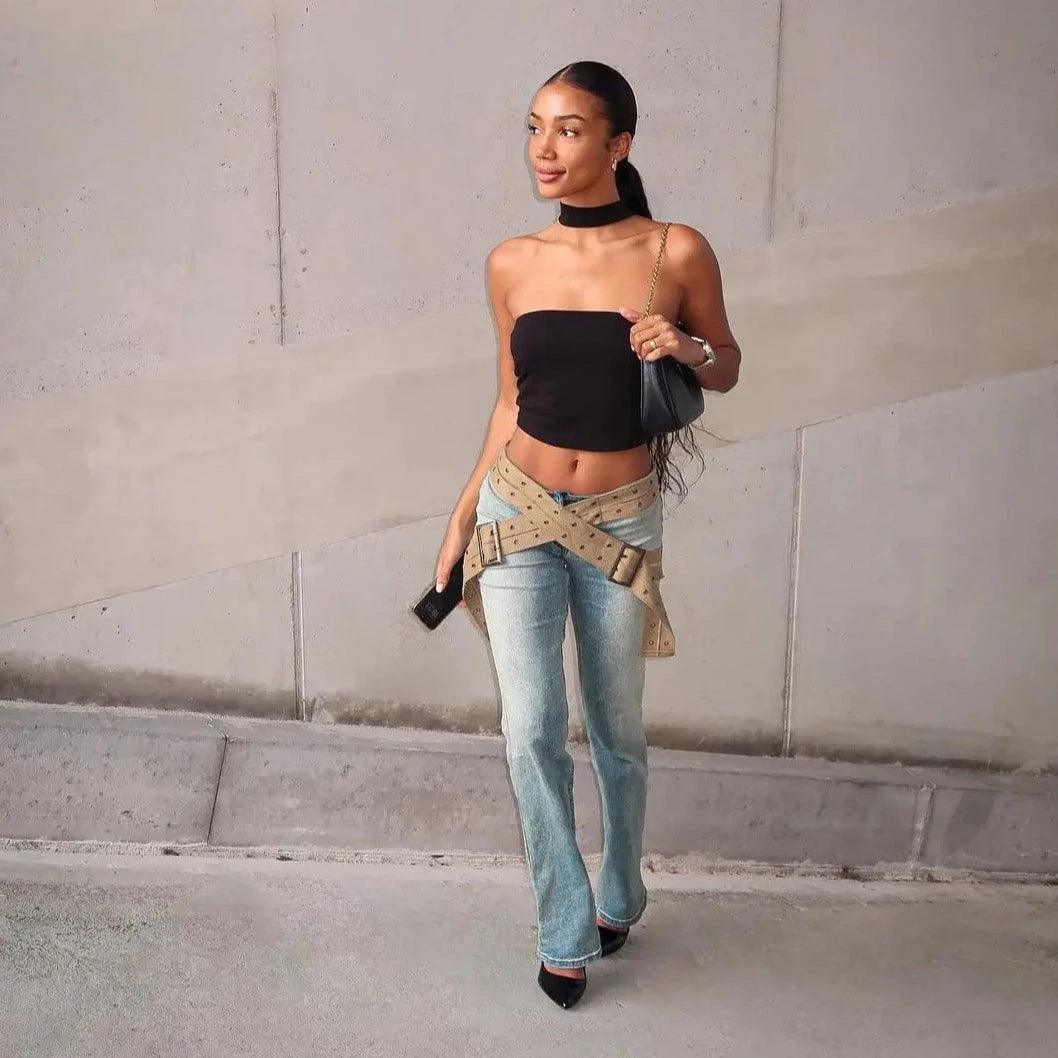 strapless black crop top with blue denim jeans, casual look