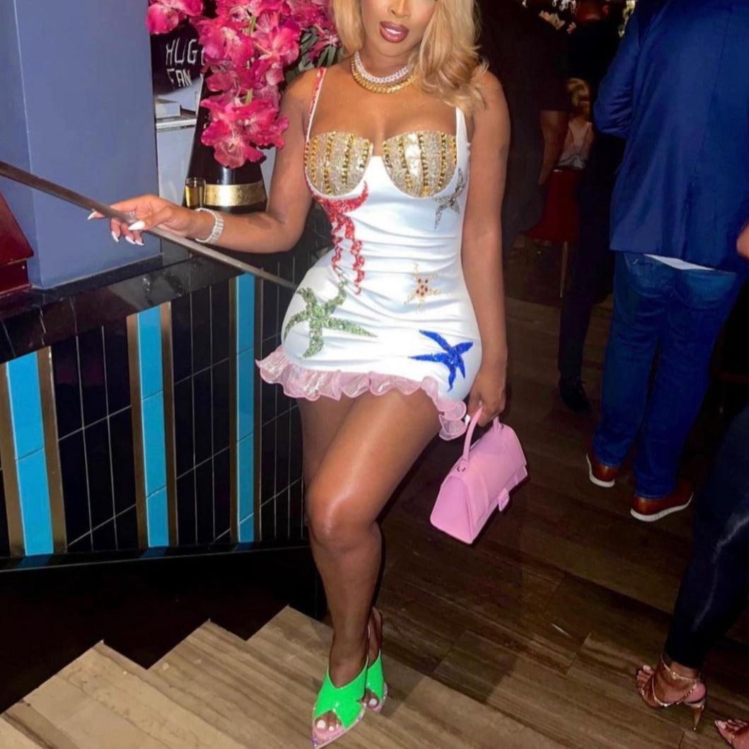 embellished mini dress with sea-themed design, party outfit