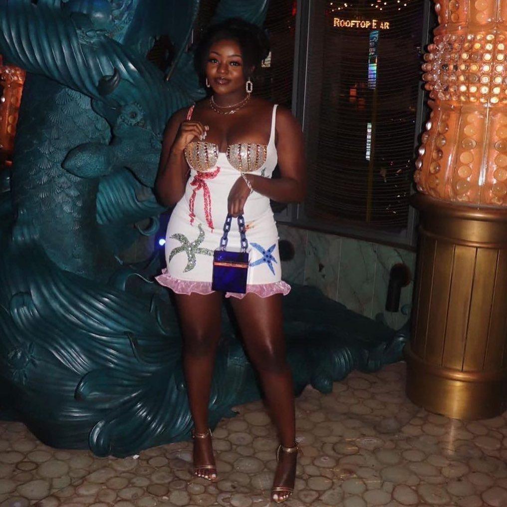 beaded mini dress with shell motif, night-out style