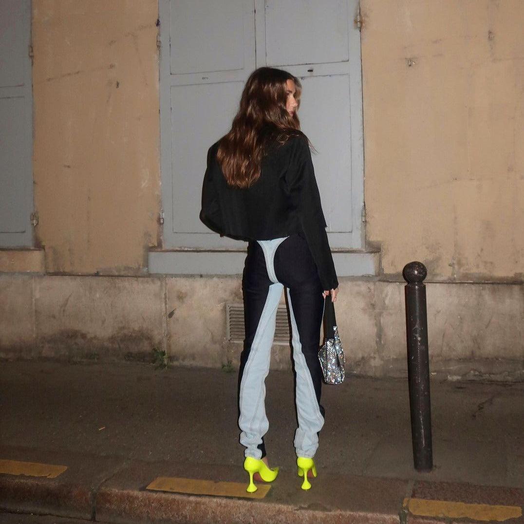 contrast leg pants with unique cutout design, paired with neon heels, evening look