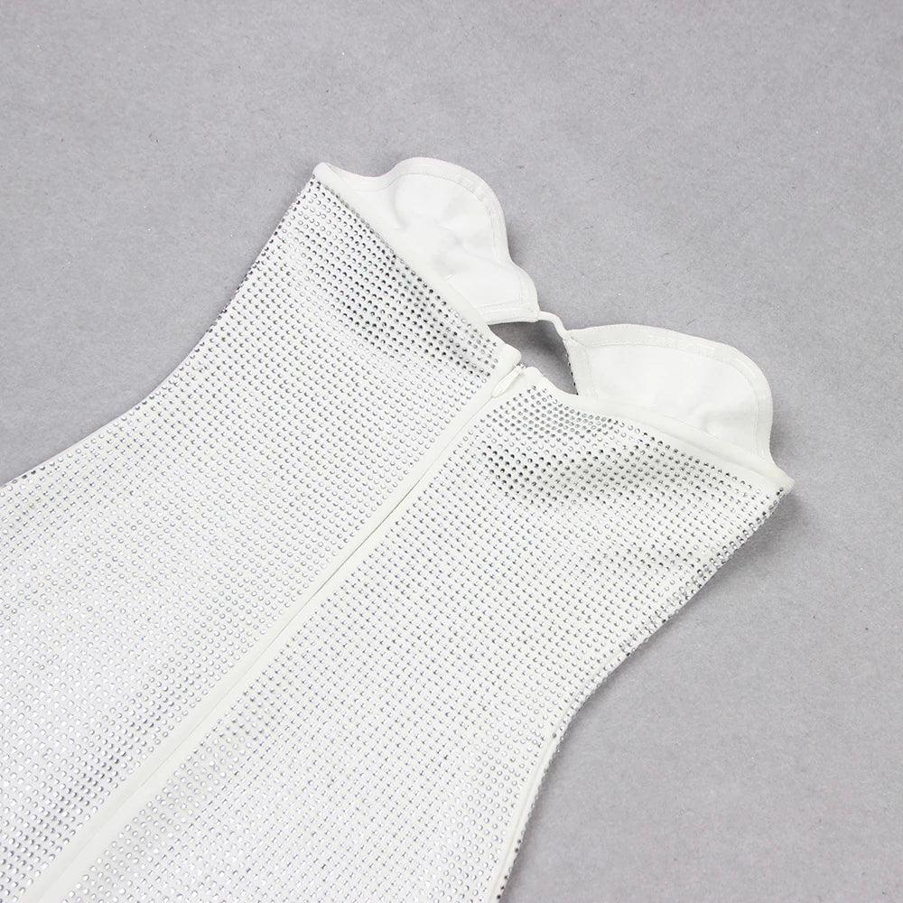 Silver mini dress featuring a diamond pattern, sweetheart neckline, and back zipper, perfect for a night out.