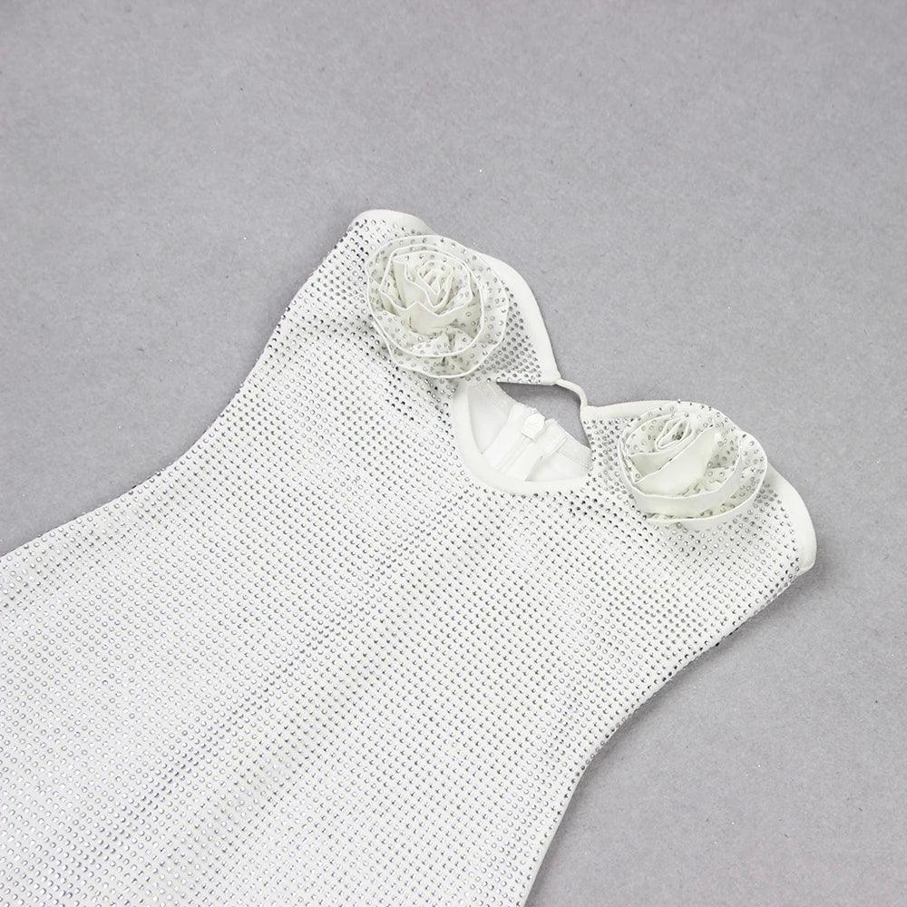 Silver mini dress with floral embellishments, sleeveless design, perfect for summer outings or evening events.