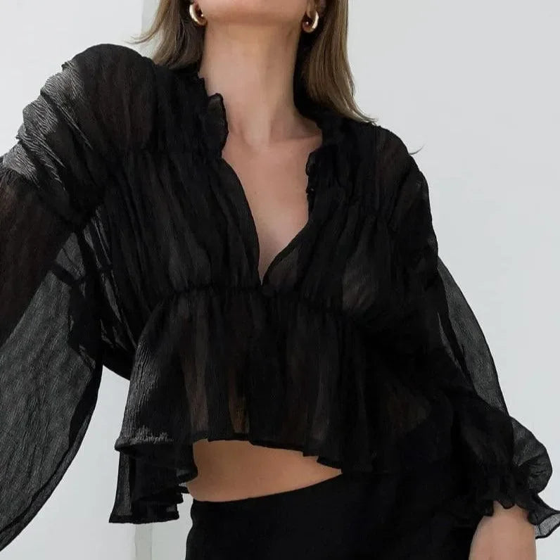 black sheer ruffled blouse with long sleeves, elegant evening style