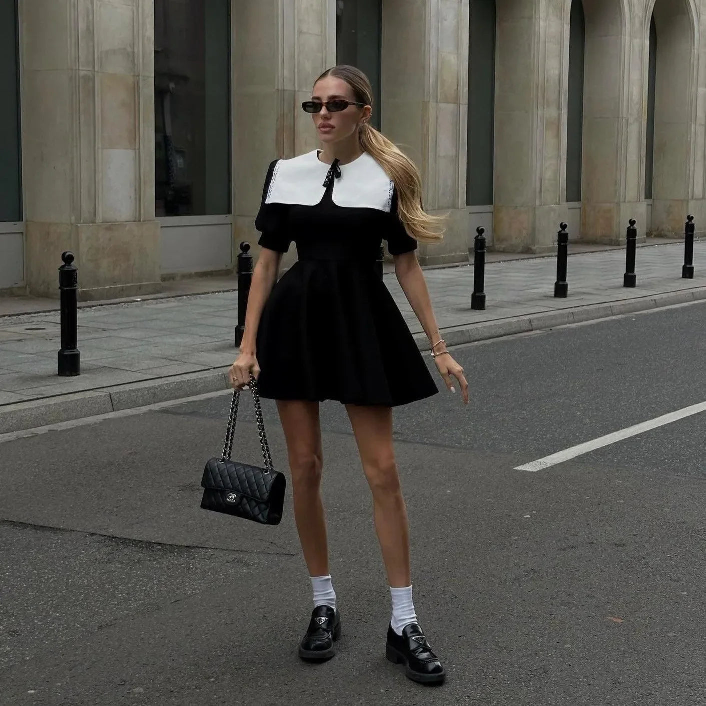 black mini dress with white collar, street style look