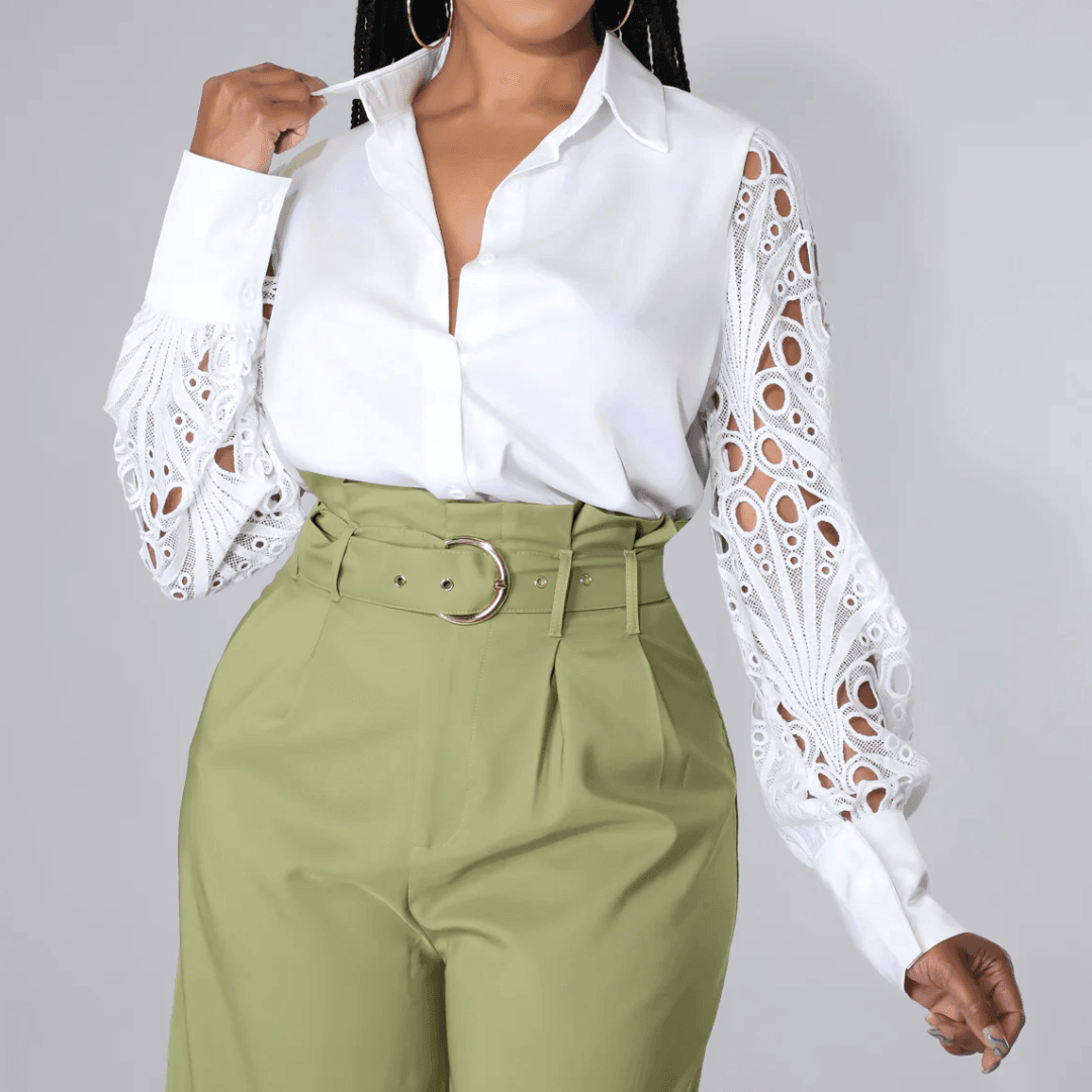 White lace satin blouse featuring intricate lace sleeves, styled with high-waisted olive green trousers for a chic look.