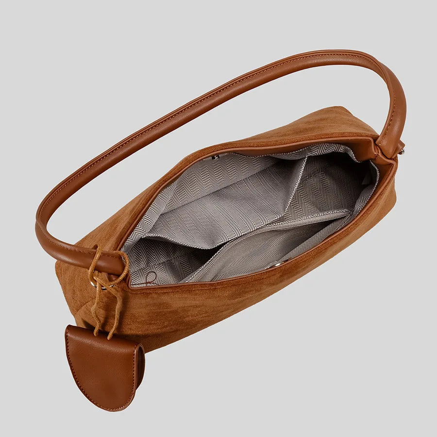 brown suede shoulder bag with leather strap