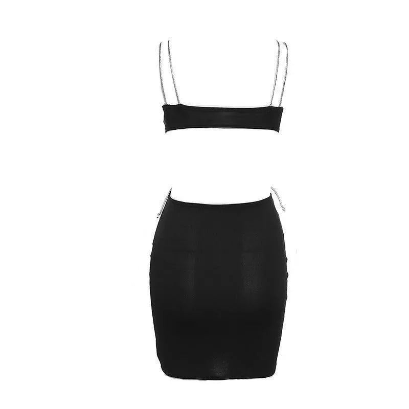 Black bodycon mini skirt with matching crop top for party nights.