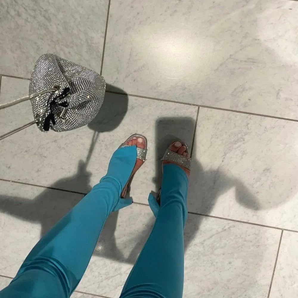 crystal heels with blue satin pants and silver rhinestone bag, evening look
