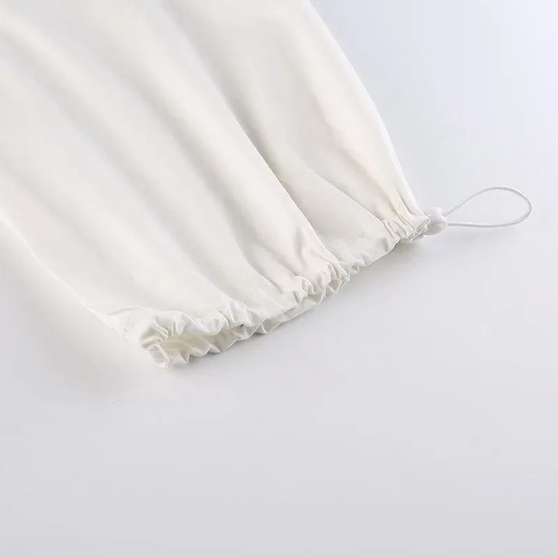 drawstring hem detail on long sleeve top