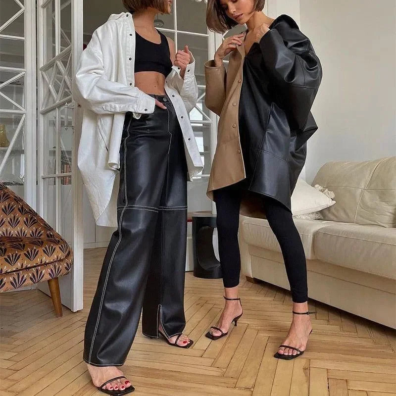 oversized leather blazer with black crop top and wide-leg leather pants, casual chic look
