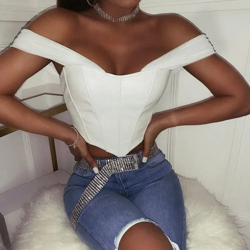 white off-shoulder corset top, paired with rhinestone belt, night-out style