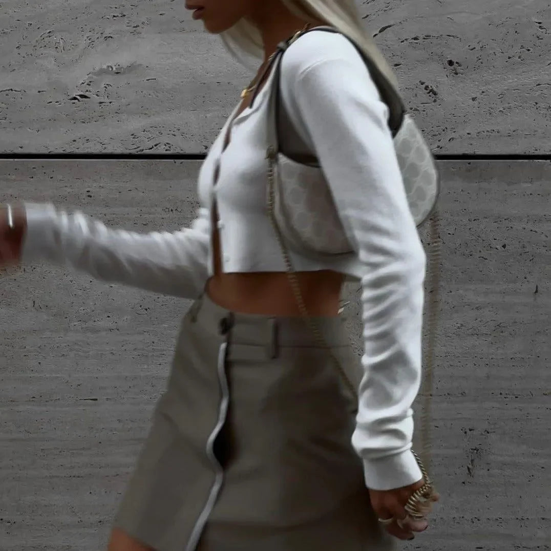 white long-sleeve crop top with button detail and beige mini skirt, day outfit
