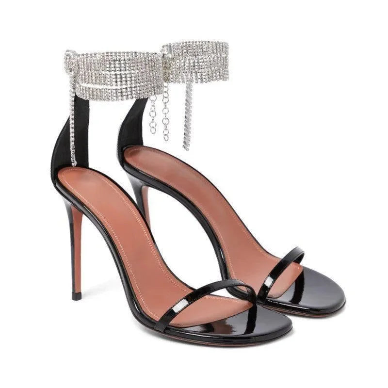 black stiletto heels with rhinestone ankle strap, evening wear