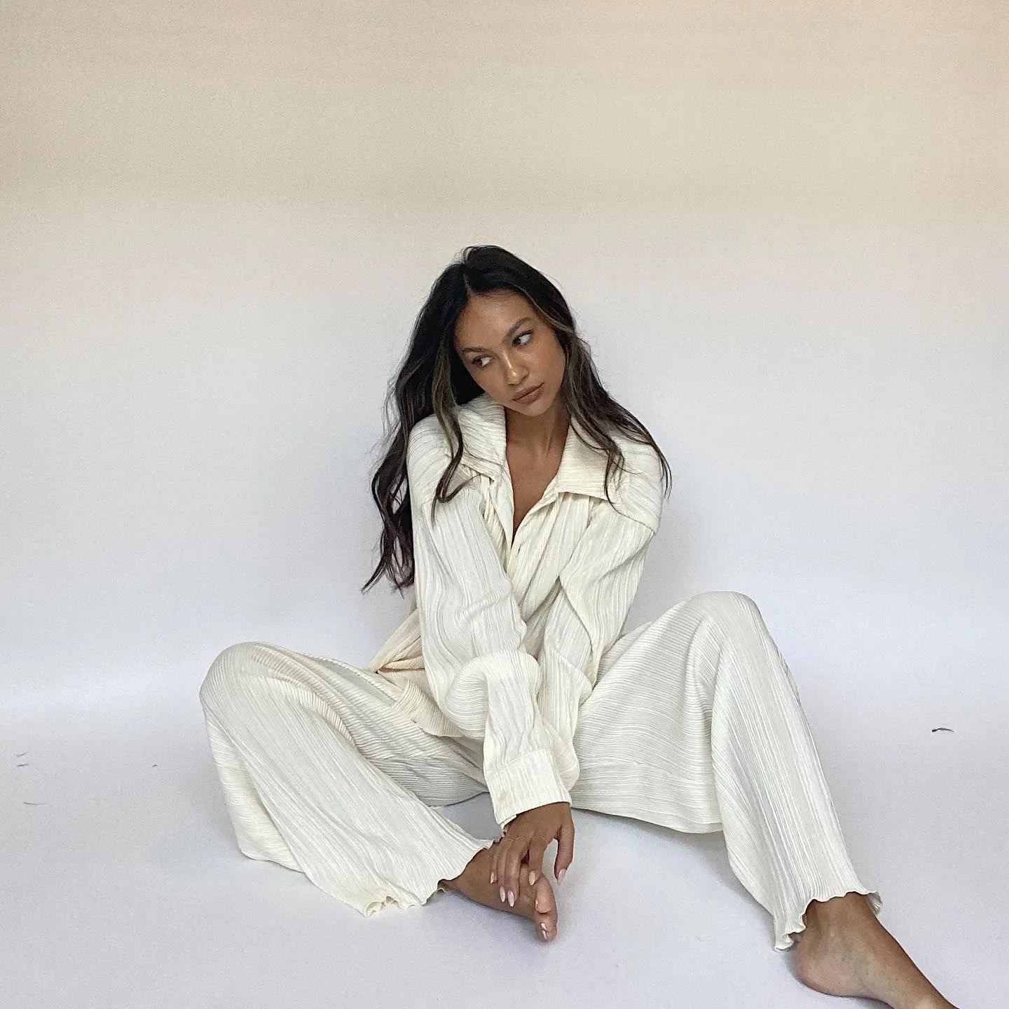 cream pleated co-ord set with collared top and wide-leg pants