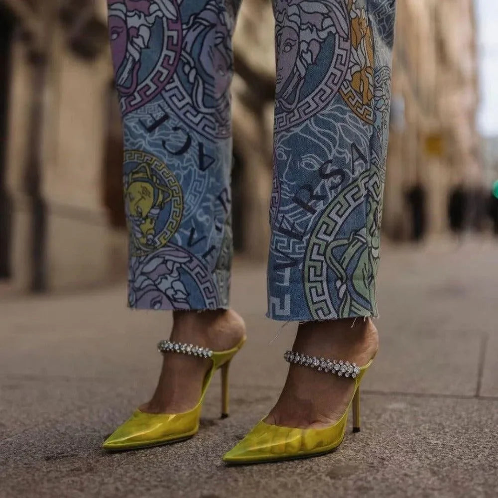 printed denim pants with crystal-strap yellow heels