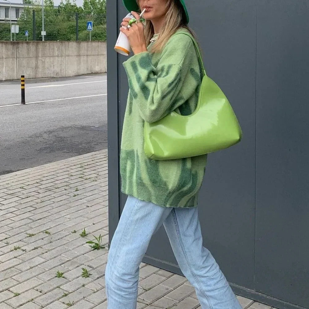 green oversized sweater with abstract pattern, casual day style