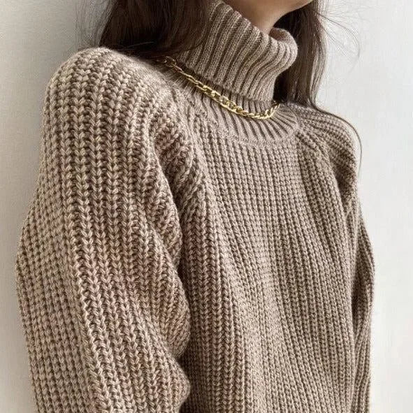 chunky knit turtleneck sweater with gold chain necklace